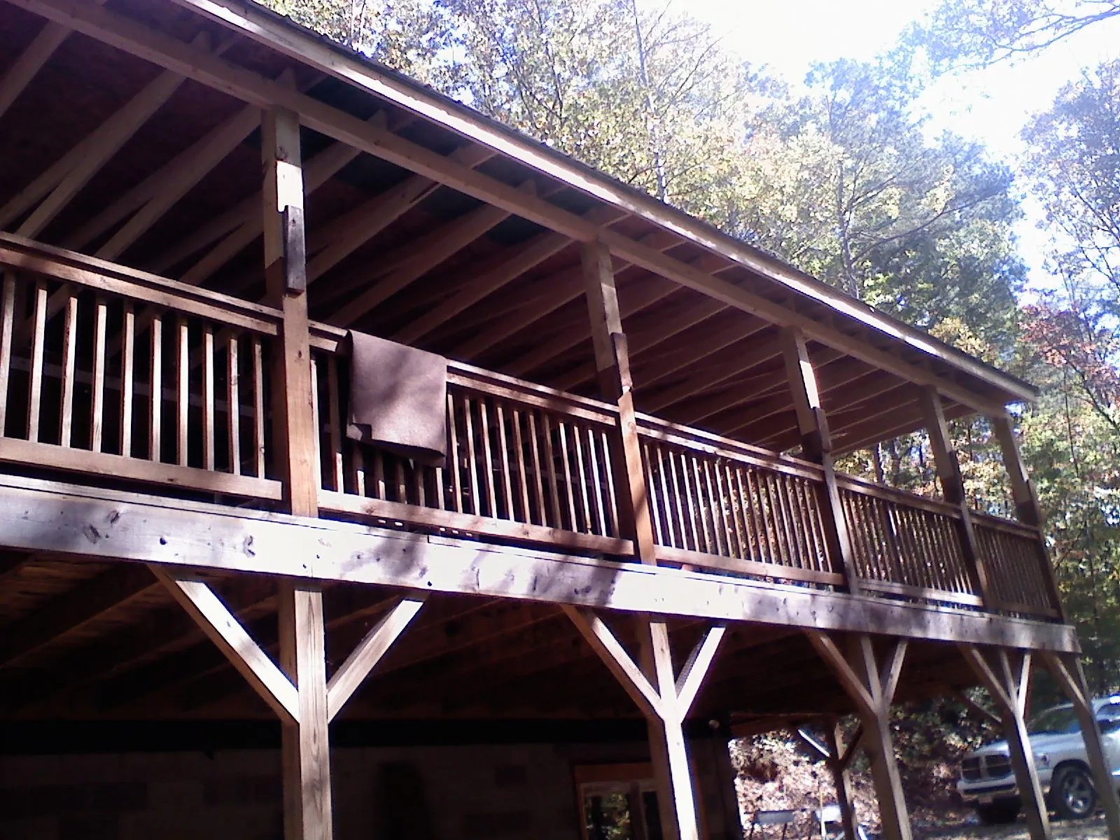 Timber framing under a new elevated porch and deck — Roof Leak Repair in Belvidere by Roofing Brothers